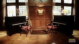 Two busty MILFs suck and fuck two guys in a piano foursome.