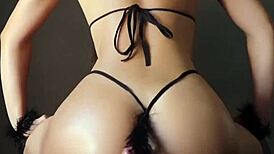 The brunette cosplay girl rides a big black cock in her fitness outfit