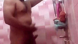 a woman reaches orgasm through masturbation in the oaxaca shower