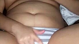 Latina amateur touches her shaved pussy