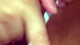 Latina amateur touches her shaved pussy