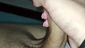 couple enjoys slow handjob session