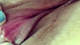 Tanned latina flaunting her natural tits and juicy pussy in a lively display.