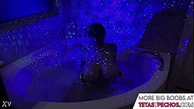 I can't stop staring at those blue big tits in the bath tub as she soaks and plays with them