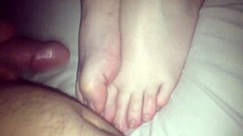 amateurs give footjobs in casual settings