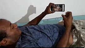 lying in bed watching ester tigresa videos touching herself but she comes to the room and gives it to him