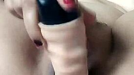 pornstar poosoo plays with dildo