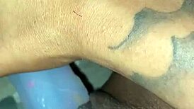 I'm stuffing my pierced pussy with this pretty dildo, feeling every homemade inch