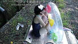 A Woman Inflates A Float In Fetish Close-Up Detail