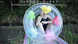 A Woman Inflates A Float In Fetish Close-Up Detail