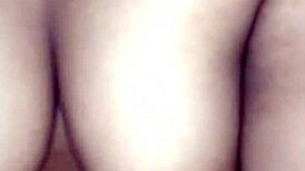 A couple engages in hardcore fucking with big tits and handjob on the couch.