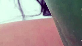 suggestive mature woman spreads legs for cucumber masturbation massage