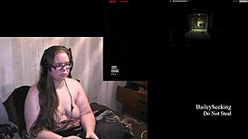 Naked brunette BBW plays Outlast with piercing and tattoos, wanna watch?