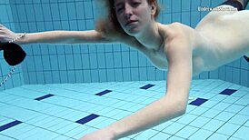 Swimming pool teen Anetta undresses for fun