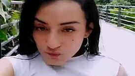 Colombian babe fingers herself on the street, showing off her boobs