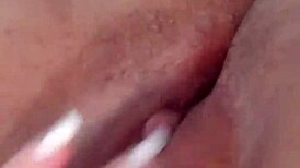 watch this naughty girl tease her pussy!