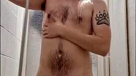 Young Hairy Guy Relaxes In Shower