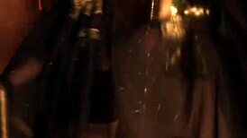 Erotic dancer in the night captivates with sensual moves and exotic allure under soft lights