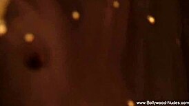 Erotic dancer in the night captivates with sensual moves and exotic allure under soft lights