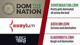 Submissive slut toyed with anal dildo in rough BDSM session.