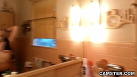 watch her oiling and lathering that petite body in the bathroom?