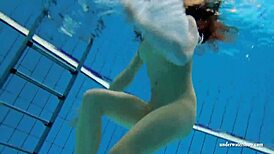 Kristy, the Hot Brunette Babe, Shows Big Boobs by the Swimming Pool Underwater in Bikini.