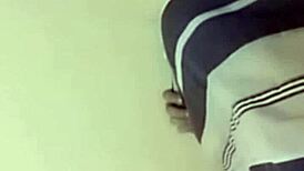 sexy couple lounging in bed sharing laughs and cuddles with soft music playing in the background