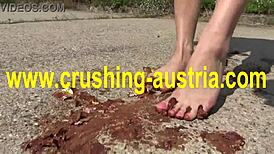 Outdoor attention is paid to feet of blonde bombshell Amber