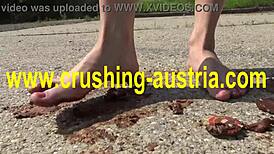 Outdoor attention is paid to feet of blonde bombshell Amber