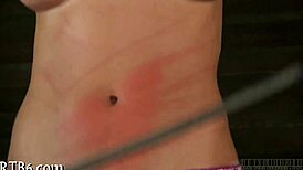 Angel rips clothes while stripping in cage