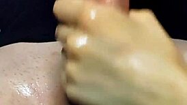 watch her oiled handjob make him cum on those tits. does it excite you?