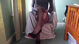 Penny in Fishnets and Heels Teases with Her Big Cock