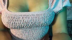 A juicy pussy drips with wetness in close-up view