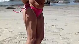 Nude milf boldly exposed in public outdoor setting.