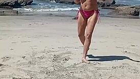 Nude milf boldly exposed in public outdoor setting.