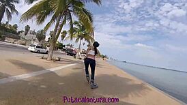 she walks along the boardwalk, showing off her ass, and ends up getting fucked doggystyle outdoors