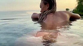 monika fox strips naked in a beautiful place and masturbates her big tattooed tits