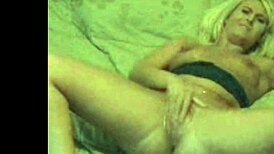 Blond milf squirts on big black dildo.