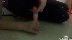 watch this girl give passionate handjob to dildo while fingering pussy