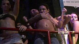 Spring break club flashing in night club outdoor setting.