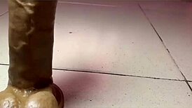 Hey, check out maami igbagbo toying her sexy pussy with a dildo bent over