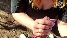 french amateur couple jerks off outdoors, ending with facial in mouth