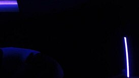 Carrie B indulging in blacklight sex with small tits.