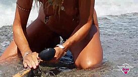 Wow, check nippleringlover, hot mom with extreme stretched nipple piercings at nude beach! 😍