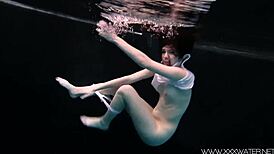 Andrejka swims naked in the pool