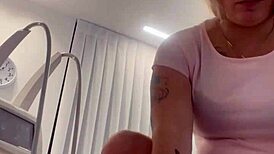 Blonde Tattoo Tease Removing Clothes