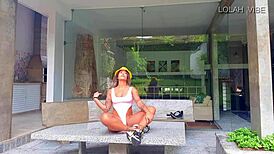 Teacher shows stretching class with big ass.