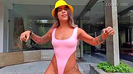 Teacher shows stretching class with big ass.