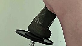 Watch that monster black dildo fuck my ass on the machine!