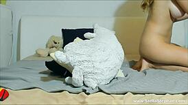 Blonde babe masturbates with a big dildo, showing off her tits and ass 😏